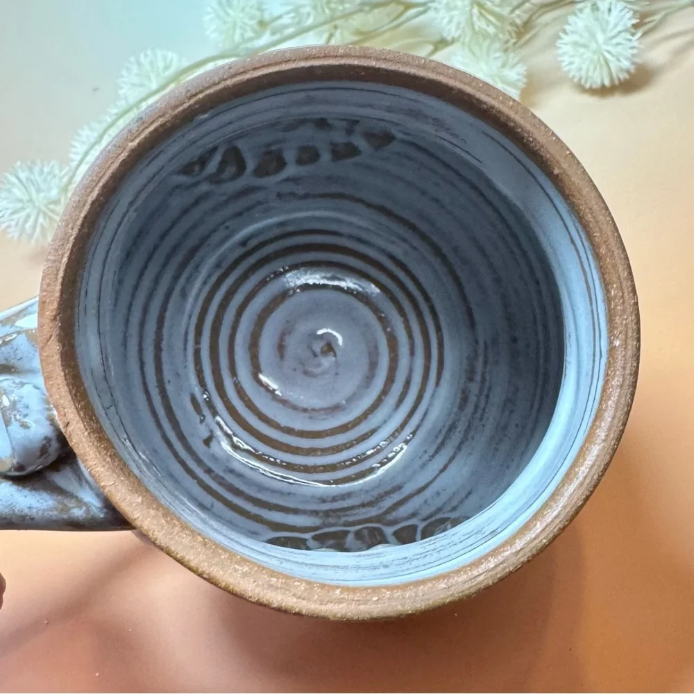 Artist Signed Wheel Spun Pottery mug. Handmade custom piece